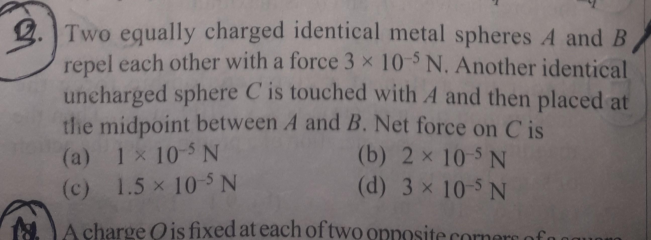 Two equally charged identical metal spheres A and B Physics