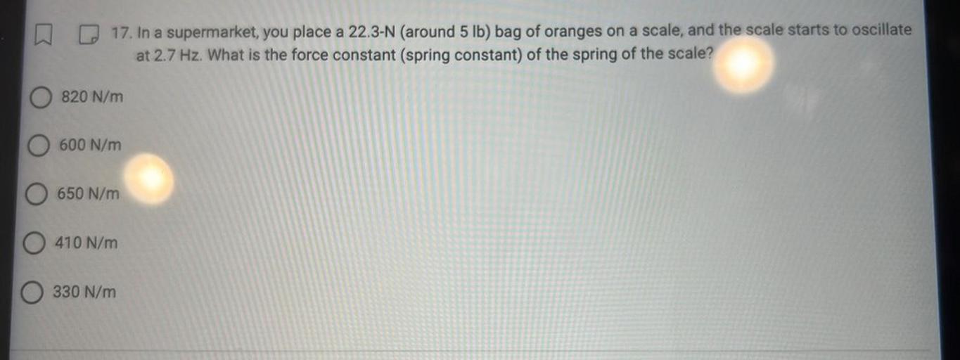 17. In a supermarket, you place a 22.3N (around 5 l... Physics
