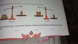 Aşağıda eşit kollu bir terazinin Görsel 1 ve Görsel 2'deki durumları verilmiştir.
Görsel 1
rida verilenlere göre 1 tane küpün kütlesinin kilogram cinsinden değeri aşağıdakilerden hangisi
lir?
B) 1,1
73
MATES
Görsel 2
C) 1,3
D) 1,5