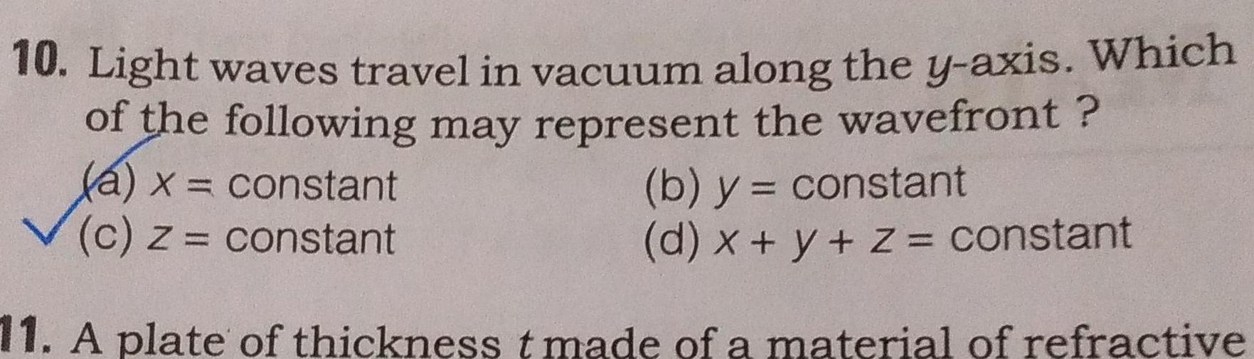 10 Light waves travel in vacuum along the y axis Which of the following may represent the wavefront a x constant c z constant b y constant d x y z constant 11 A plate of thickness t made of a material of refractive