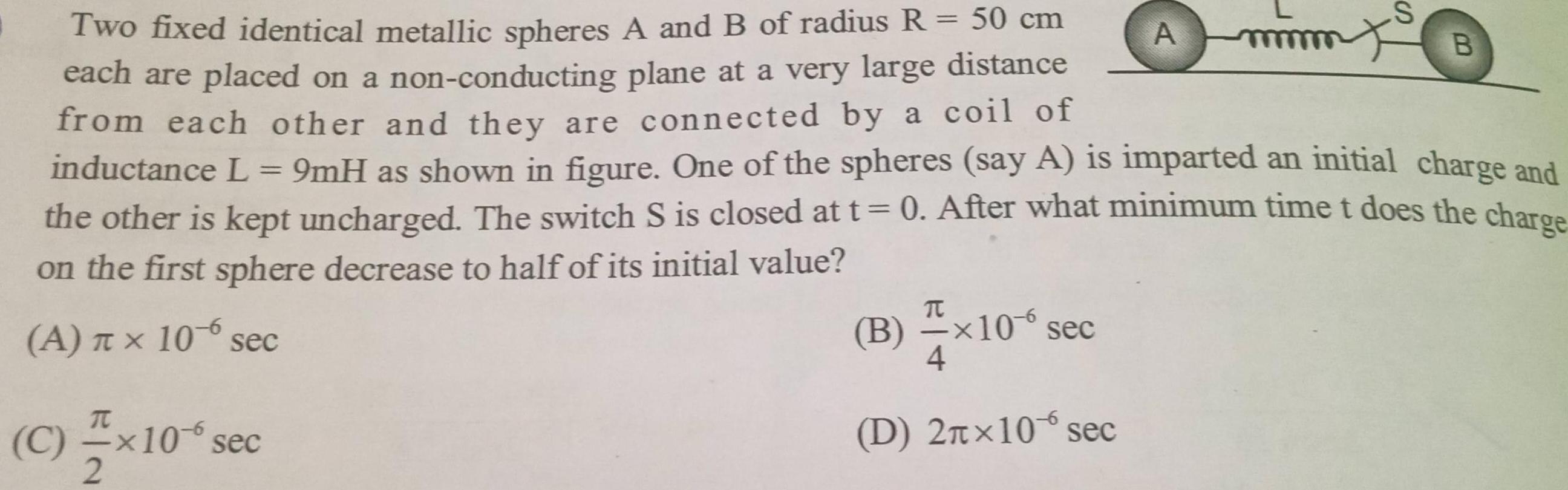Two fixed identical metallic spheres A and B of radius R 50