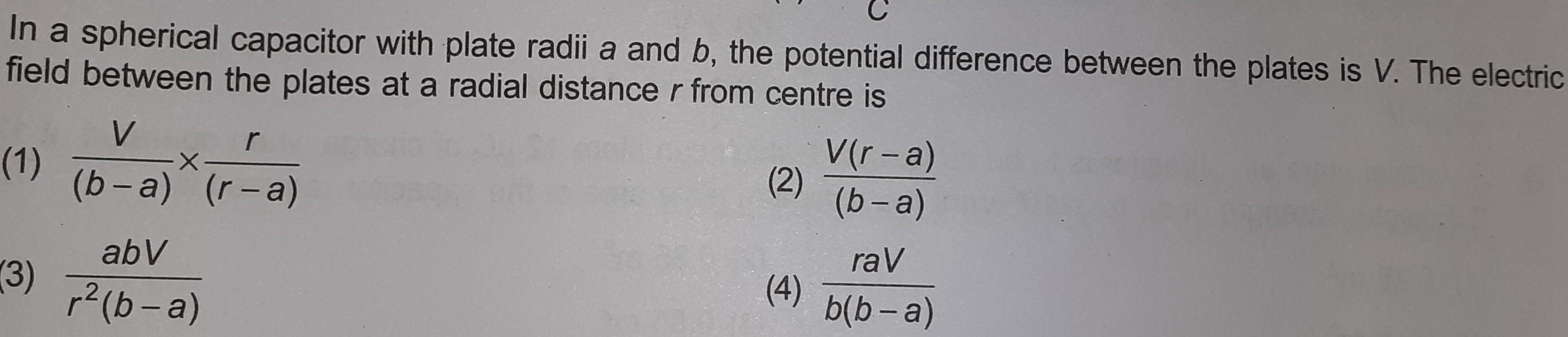 In a spherical capacitor with plate radii a and b the
